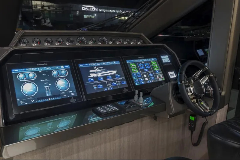 Slide: The Image of Manufacturer Provided Image: Galeon 640 Fly 2025 yacht cockpit with advanced navigation screens and controls. - 18