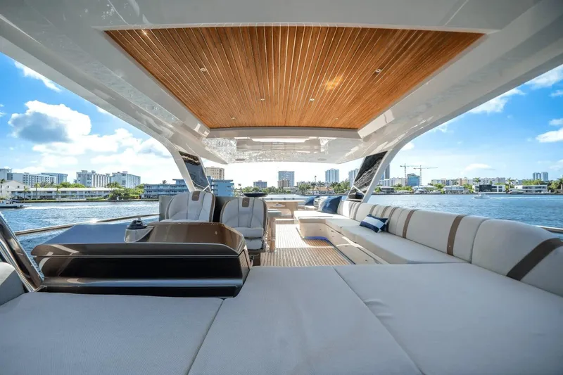 Slide: The Image of Luxurious 2026 Galeon 640 Fly yacht interior with spacious seating and scenic waterfront view. - 25