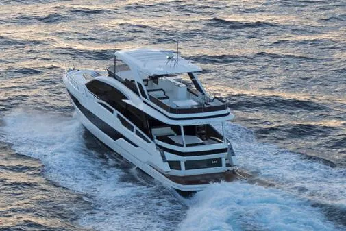 Slide: The Image of Manufacturer Provided Image: 2025 Galeon 640 Fly yacht cruising on open water. - 28