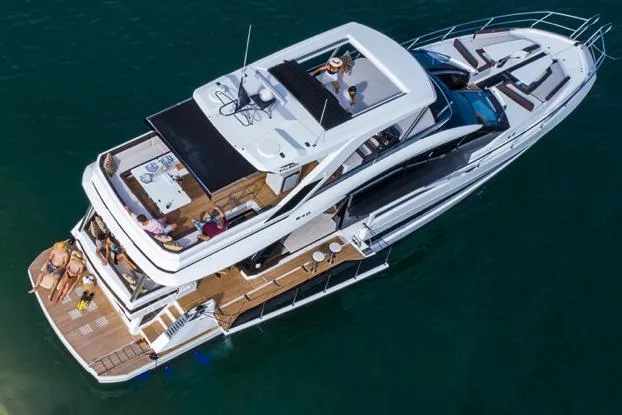Slide: The Image of Manufacturer Provided Image: Aerial view of 2025 Galeon 640 Fly luxury yacht on water. - 4