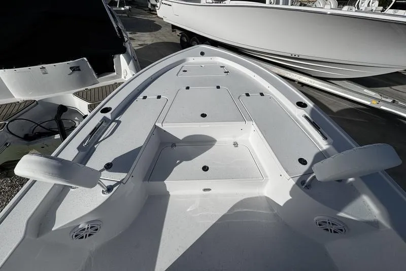 Slide: The Image of 2026 Sportsman Masters 247 Bay Boat deck, featuring spacious storage and seating areas. - 4
