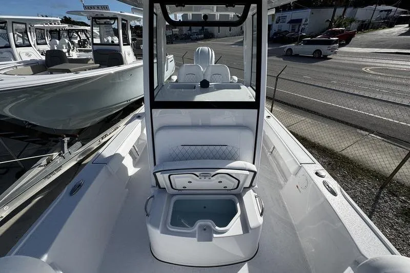 Slide: The Image of 2026 Sportsman Masters 247 Bay Boat interior with open storage compartment. - 8