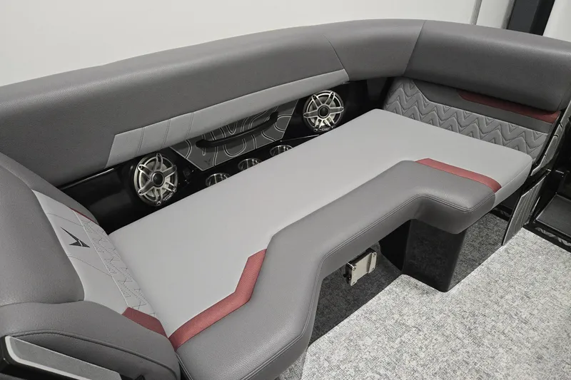 Slide: The Image of 2026 Revel RS25 interior with modern gray and red seating, featuring built-in speakers. - 3