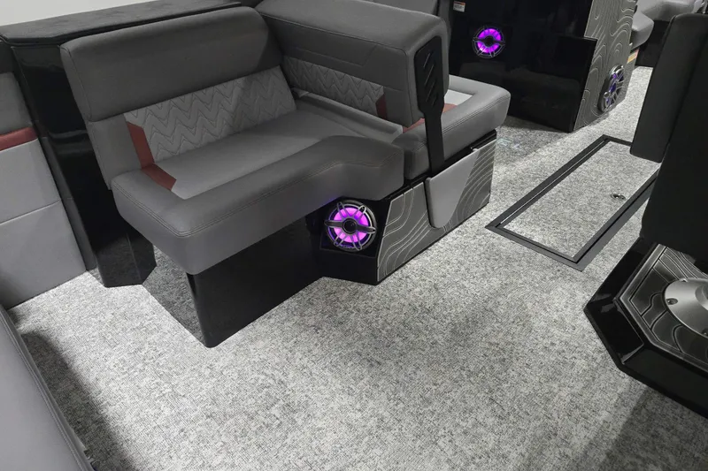 Slide: The Image of 2026 Revel RS25 interior with modern seating and illuminated speakers. - 5