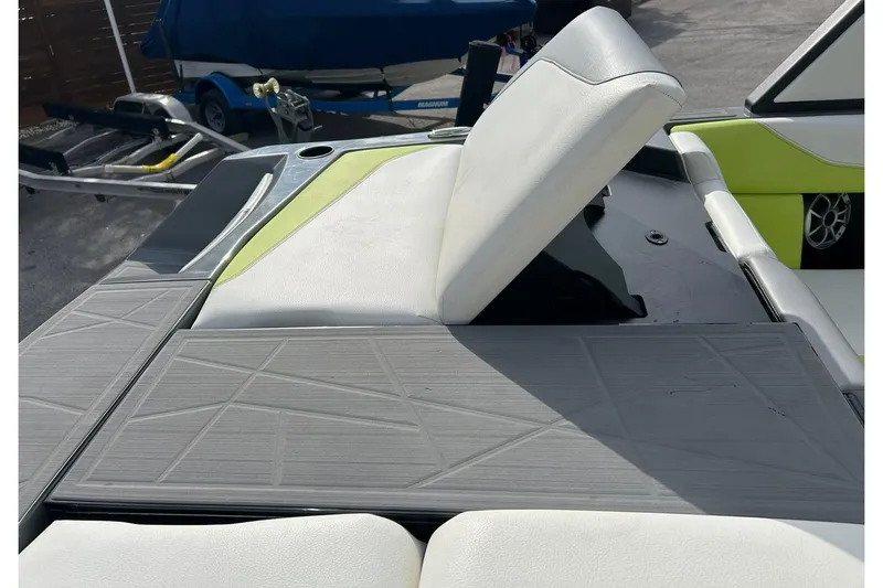 Slide: The Image of 2021 ATX 22 Type-S boat interior with adjustable seating and modern design. - 22