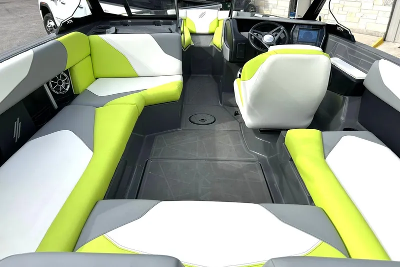 Slide: The Image of Interior of 2021 ATX 22 Type-S boat with lime green and gray seating. - 3