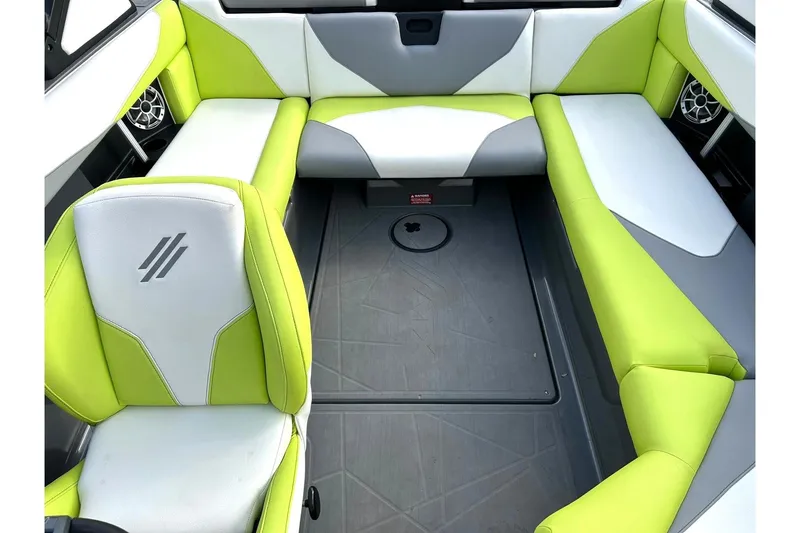 Slide: The Image of 2021 ATX 22 Type-S boat interior with lime green and white seating. - 33