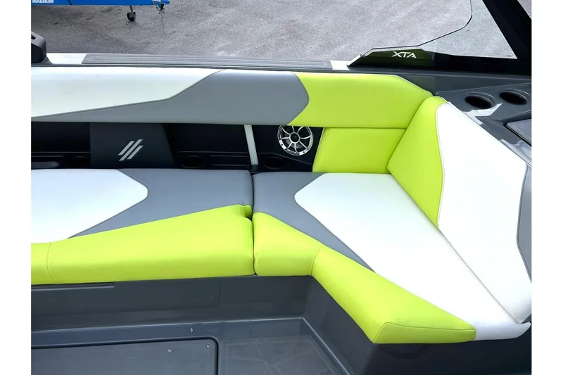 Slide: The Image of Interior seating of 2021 ATX 22 Type-S boat with lime green and white upholstery. - 37