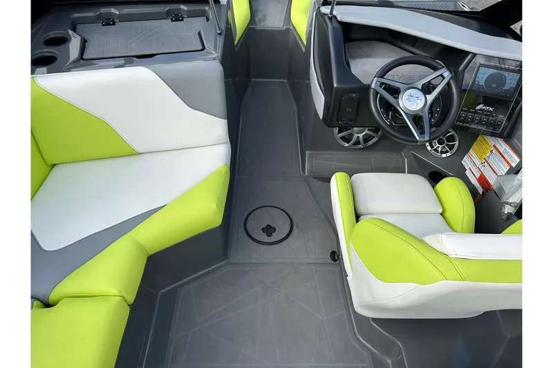 Slide: The Image of Interior of 2021 ATX 22 Type-S boat with lime green and white seating. - 39