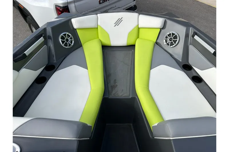 Slide: The Image of 2021 ATX 22 Type-S boat interior with lime green and gray seating. - 47