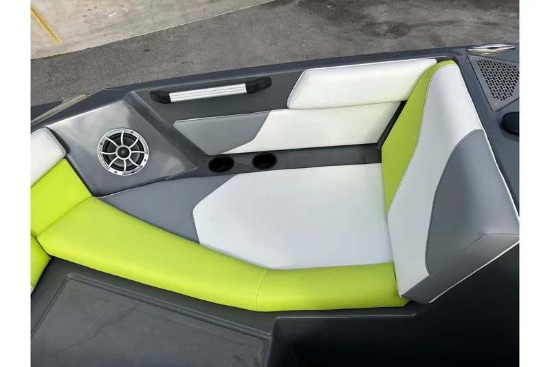 Slide: The Image of Interior of 2021 ATX 22 Type-S boat with green and white seating. - 48
