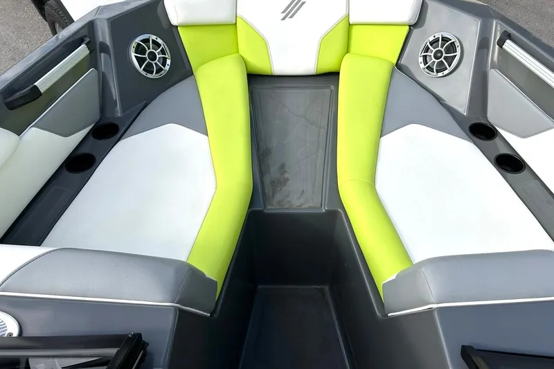 Slide: The Image of Interior of 2021 ATX 22 Type-S boat with lime green and white seating. - 5
