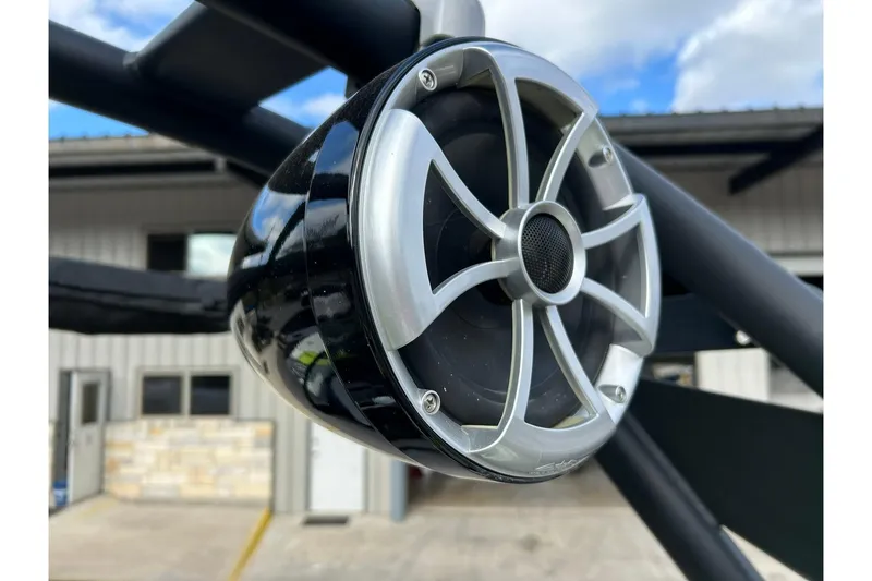 Slide: The Image of Close-up of a 2021 ATX 22 Type-S boat speaker with a sleek metallic grille. - 52