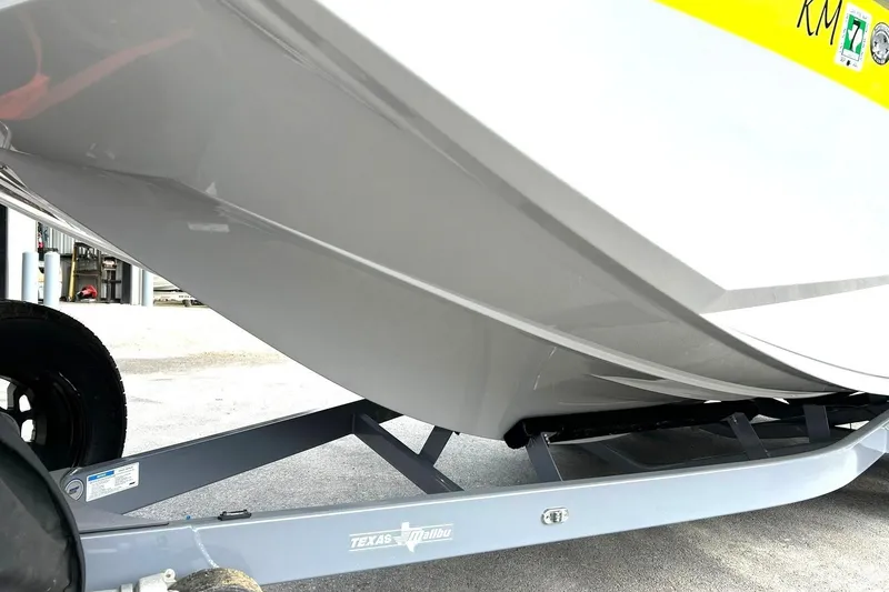 Slide: The Image of 2021 ATX 22 Type-S boat on trailer, showcasing sleek hull design. - 9