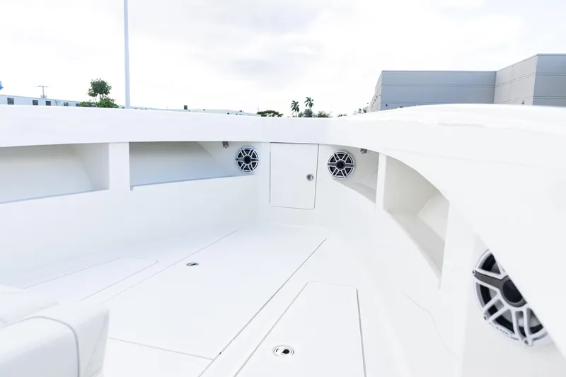 Slide: The Image of 2021 SeaVee 322Z boat interior with speakers and storage compartments. - 14