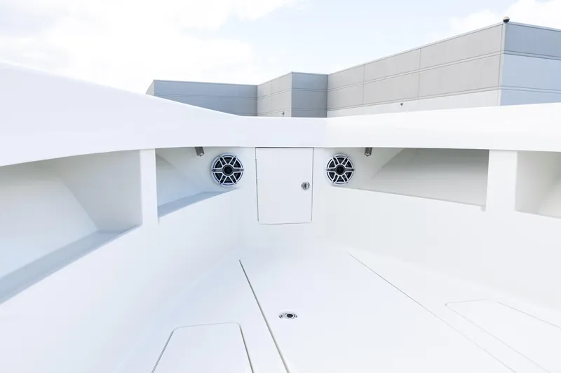 Slide: The Image of 2021 SeaVee 322Z boat interior with speakers and storage compartments. - 17