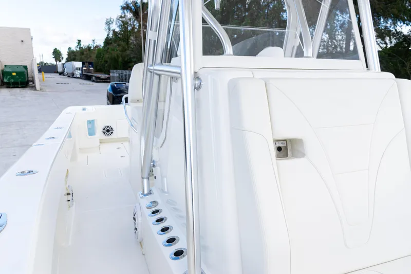 Slide: The Image of 2021 SeaVee 322Z boat with sleek white interior and modern design features. - 19