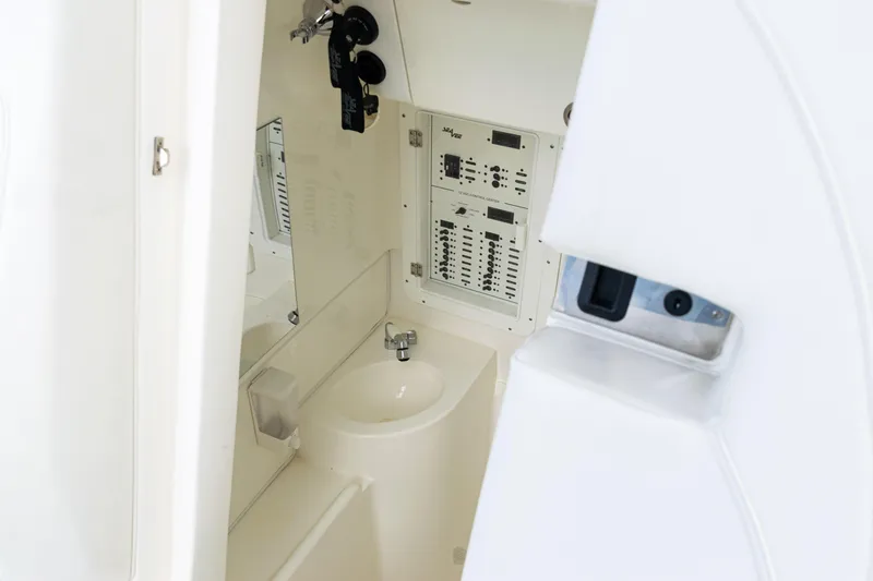 Slide: The Image of 2021 SeaVee 322Z boat interior with control panel and sink. - 22