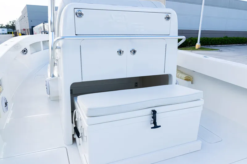 Slide: The Image of 2021 SeaVee 322Z boat interior with storage and seating area. - 31