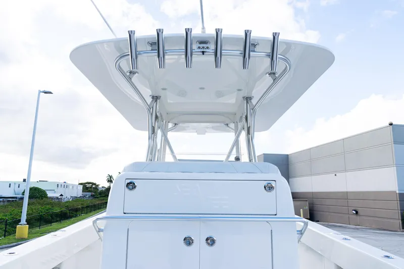 Slide: The Image of 2021 SeaVee 322Z boat, rear view, showcasing sleek design and modern features. - 41