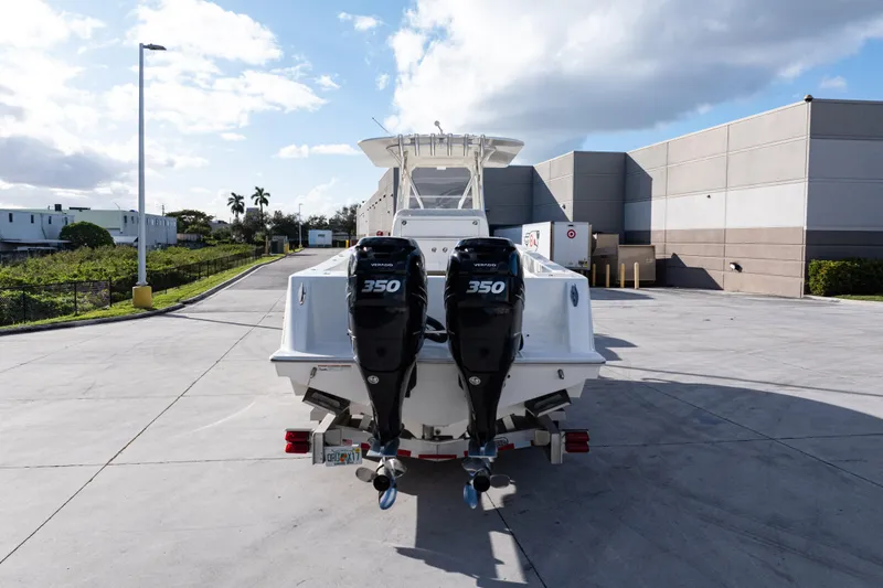 Slide: The Image of 2021 SeaVee 322Z boat with dual 350 engines parked outdoors. - 43