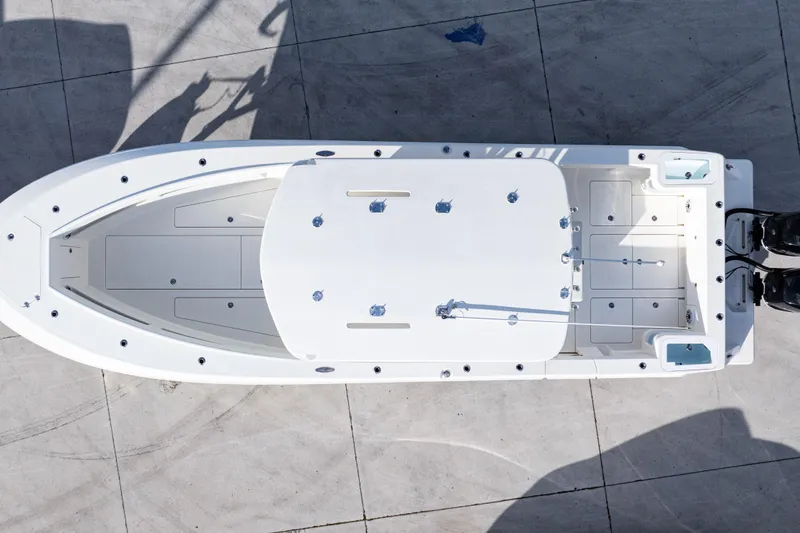 Slide: The Image of Top view of a 2021 SeaVee 322Z boat on a concrete surface. - 6