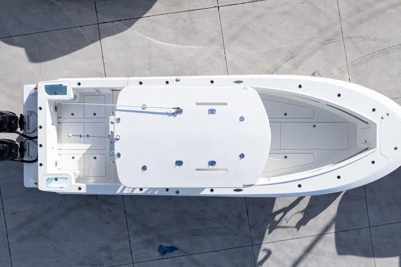 Slide: The Image of Overhead view of 2021 SeaVee 322Z boat on concrete surface. - 9