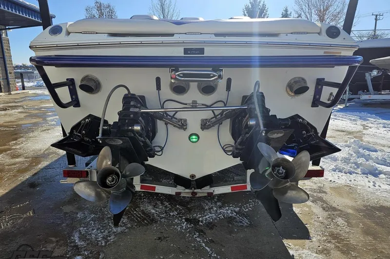 Slide: The Image of Rear view of a 2001 Baja 36 Outlaw boat with dual propellers. - 28