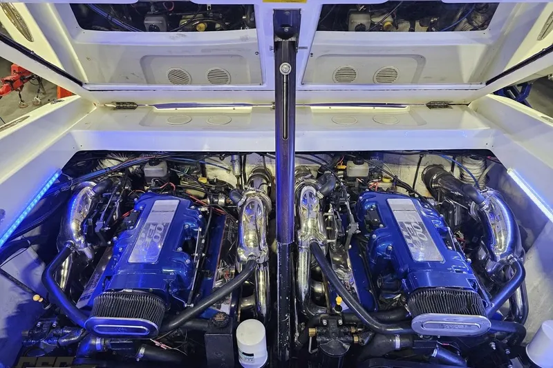 Slide: The Image of 2001 Baja 36 Outlaw engine compartment with dual high-performance engines. - 85