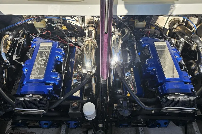 Slide: The Image of Twin Mercury 500 EFI engines in a 2001 Baja 36 Outlaw boat. - 91
