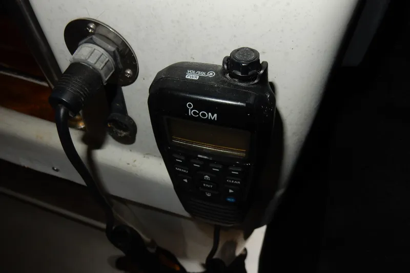 Slide: The Image of Icom radio on 1991 Beneteau Oceanis 370 sailboat interior. - 16