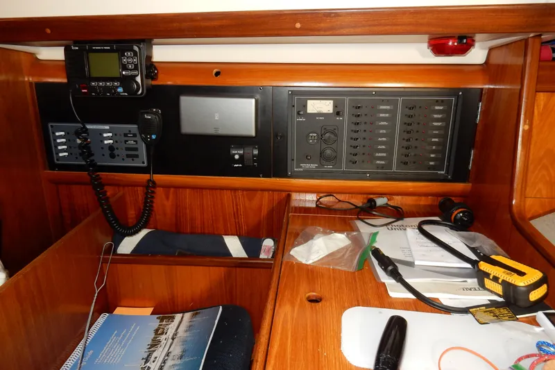 Slide: The Image of Control panel of a 1991 Beneteau Oceanis 370 sailboat with navigation equipment. - 18