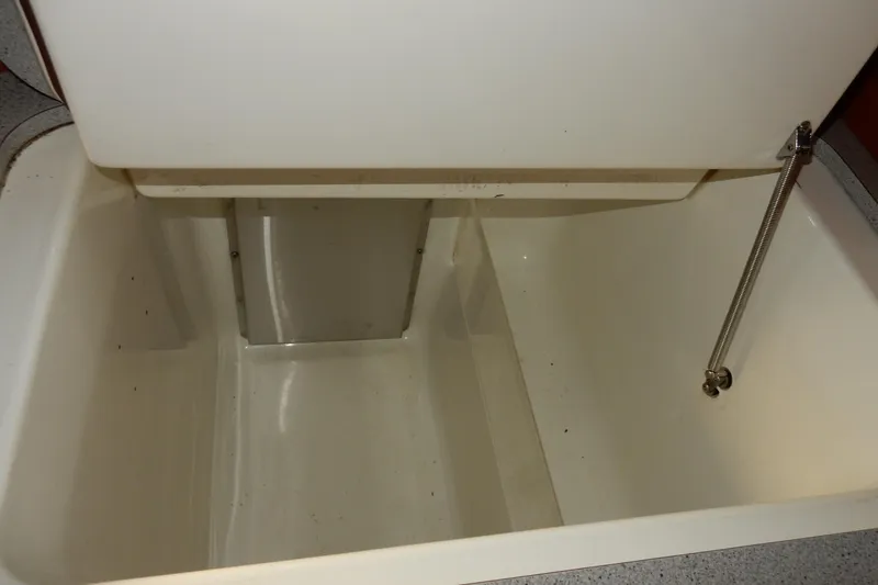 Slide: The Image of Interior storage compartment of a 1991 Beneteau Oceanis 370 sailboat. - 22