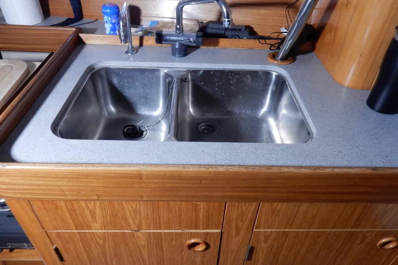 Slide: The Image of Stainless steel double sink in 1991 Beneteau Oceanis 370 yacht kitchen. - 24