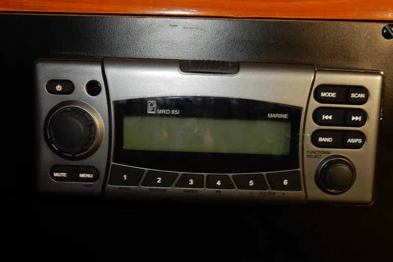 Slide: The Image of Marine stereo system on a 1991 Beneteau Oceanis 370 sailboat dashboard. - 29