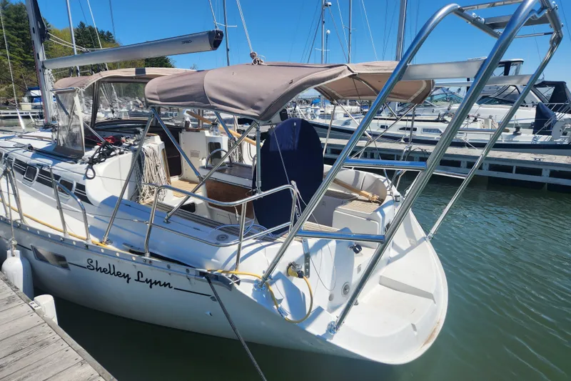 Slide: The Image of 1991 Beneteau Oceanis 370 sailboat docked at marina, sunny day. - 3