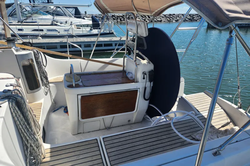 Slide: The Image of Cockpit of 1991 Beneteau Oceanis 370 sailboat docked at marina. - 4