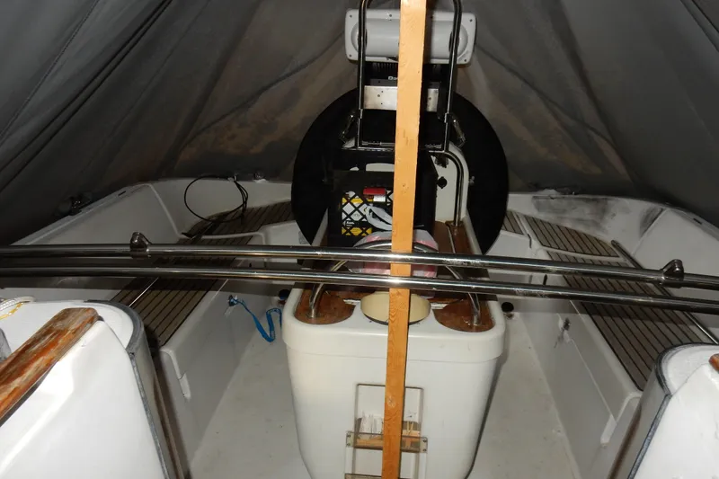 Slide: The Image of 1991 Beneteau Oceanis 370 cockpit with covered helm and seating area. - 42