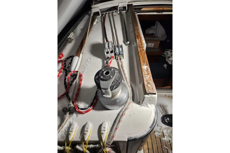 Slide: The Image of Deck of 1991 Beneteau Oceanis 370 sailboat with winch and ropes. - 48