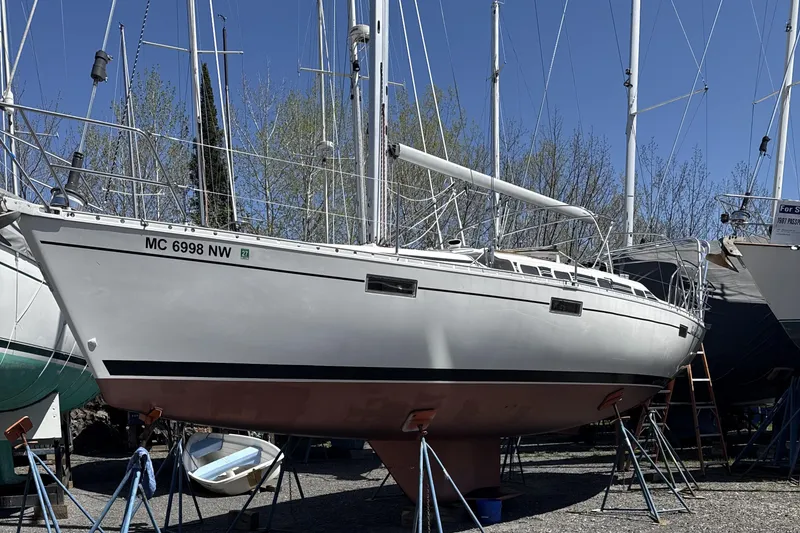 Slide: The Image of 1991 Beneteau Oceanis 370 sailboat on stands, ready for maintenance. - 8