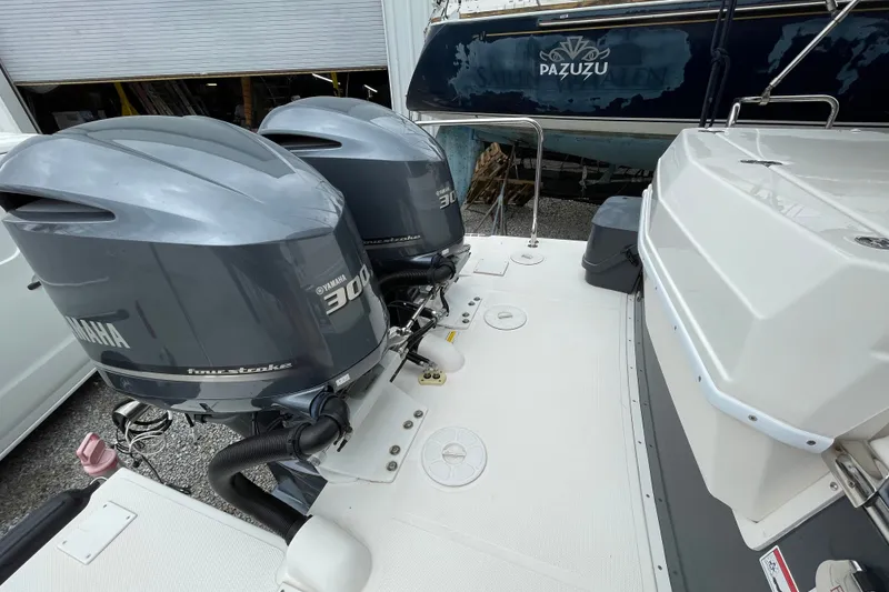 Slide: The Image of 2021 Cutwater C-32 CB boat with dual Yamaha 300 four-stroke engines. - 24