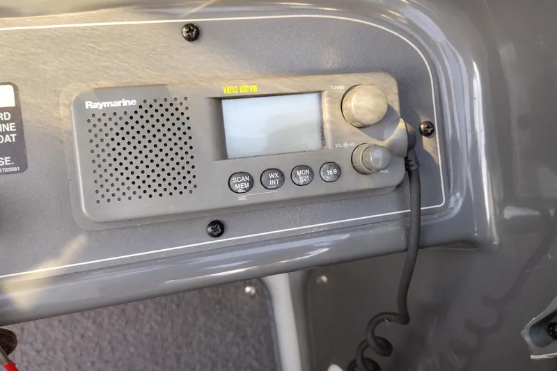 Slide: The Image of Raymarine marine radio on 2005 Bayliner 305 boat dashboard. - 43