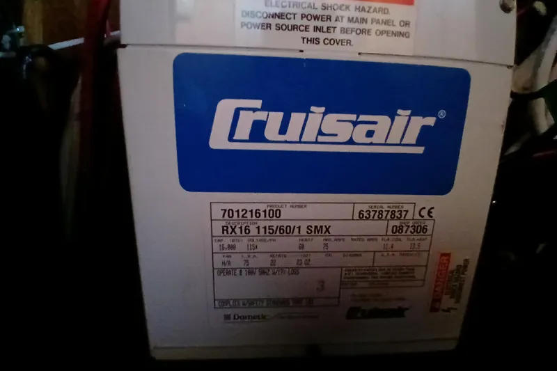 Slide: The Image of Cruisair unit label on a 1983 Wauquiez Hood boat, model RX16 115/60/1 SMX. - 34