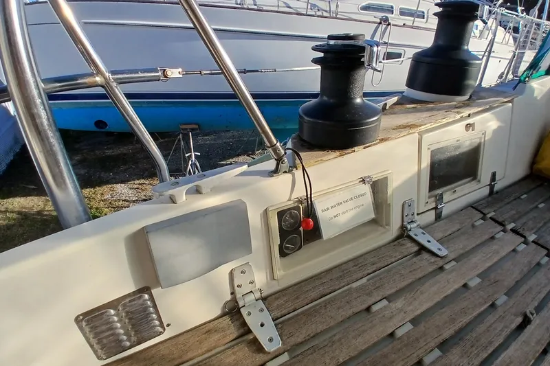 Slide: The Image of 1983 Wauquiez Hood sailboat deck with winches and control panel. - 53