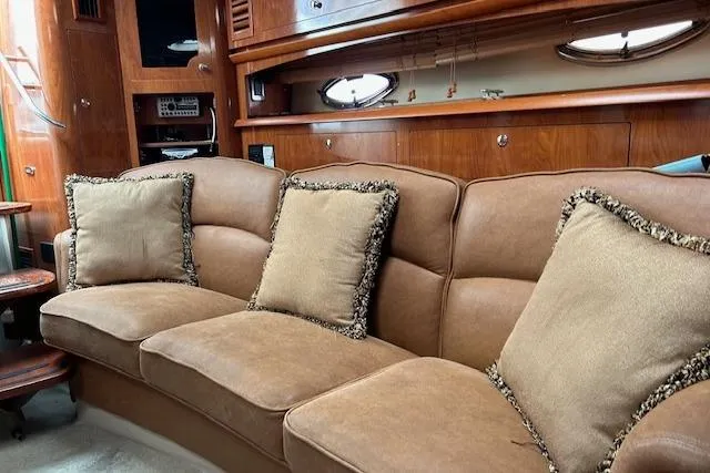 Slide: The Image of Luxurious interior of 2007 Four Winns 358 Vista yacht with plush seating and elegant wood finish. - 7