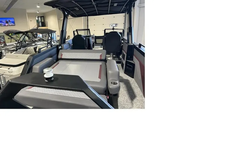 Slide: The Image of 2026 Revel RS25L boat interior with modern seating and sleek design. - 5