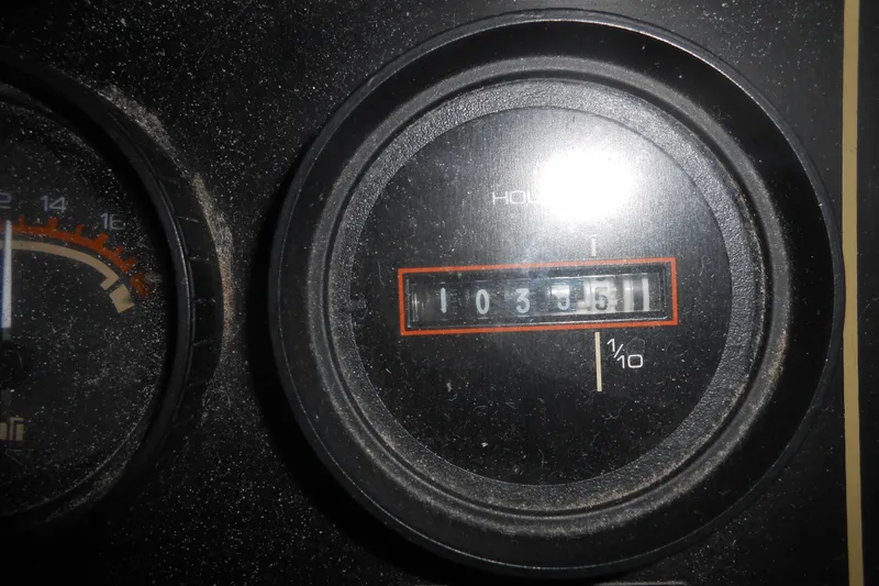 Slide: The Image of Hour meter of a 1991 Stardust Cruisers 7516 showing 1035.1 hours. - 5