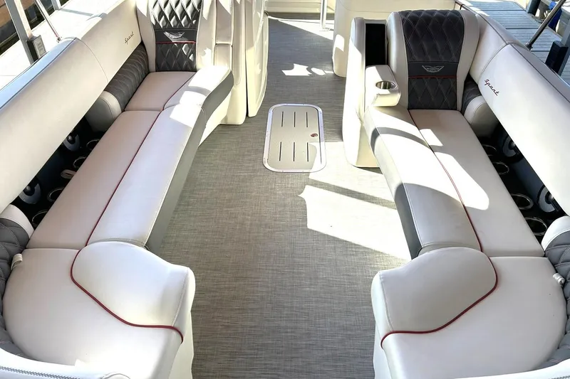 Slide: The Image of Interior of 2021 Bennington 25 RXSBA boat with luxurious seating and modern design. - 42