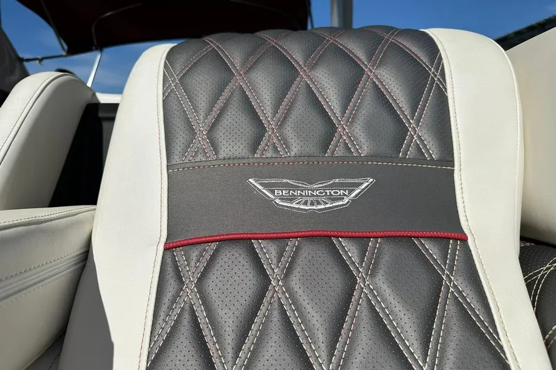 Slide: The Image of Luxurious Bennington 25 RXSBA 2021 boat seat with diamond stitching and logo detail. - 59