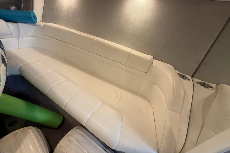 Slide: The Image of Interior of a 2000 Formula 353 FASTech boat with white leather seating. - 30